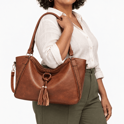 The Sunday Avenue Brown Whipstitch Fringe Tote Bag with Tassel Charm