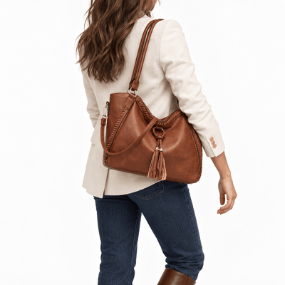 The Sunday Avenue Brown Whipstitch Fringe Tote Bag with Tassel Charm