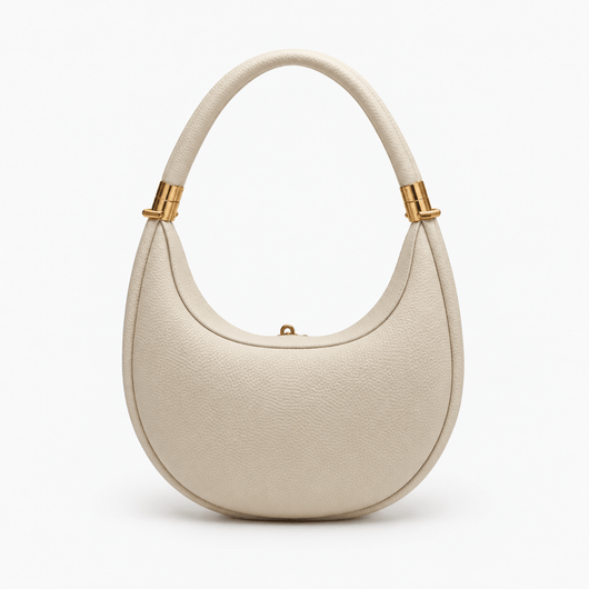 The Sunday Avenue Celeste Cream Pebbled Leather Crescent Shoulder Bag