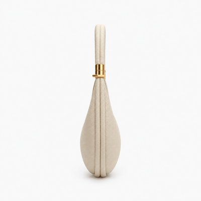 The Sunday Avenue Celeste Cream Pebbled Leather Crescent Shoulder Bag