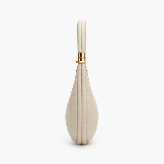 The Sunday Avenue Celeste Cream Pebbled Leather Crescent Shoulder Bag