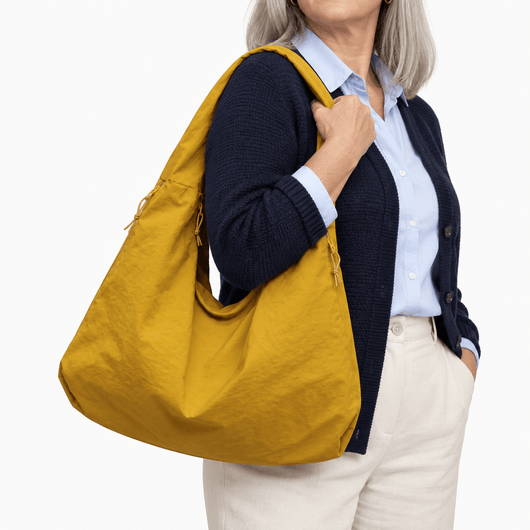 The Sunday Avenue Clara Yellow Nylon Hobo Bag with Multiple Pockets