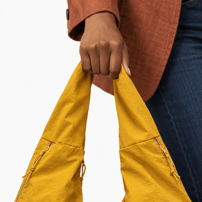 The Sunday Avenue Clara Yellow Nylon Hobo Bag with Multiple Pockets