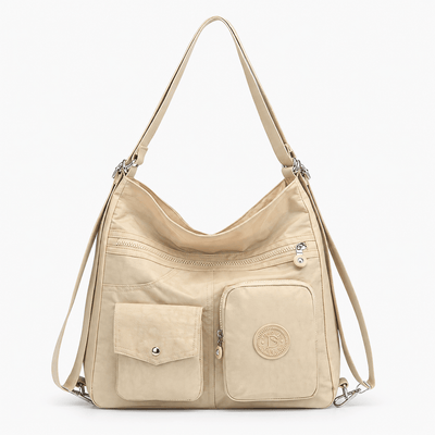 The Sunday Avenue Off-White Stacey Blue Convertible Multi-Pocket Bag