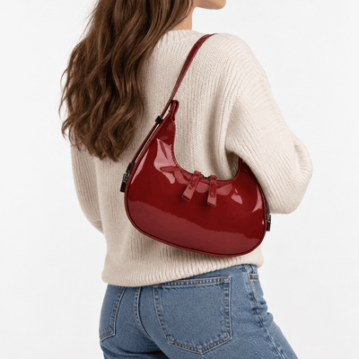 The Sunday Avenue Red Luna Red Patent Faux Leather Half-Moon Shoulder Bag