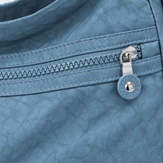 The Sunday Avenue Stacey Blue Convertible Multi-Pocket Bag