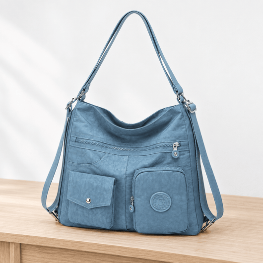 The Sunday Avenue Stacey Blue Convertible Multi-Pocket Bag
