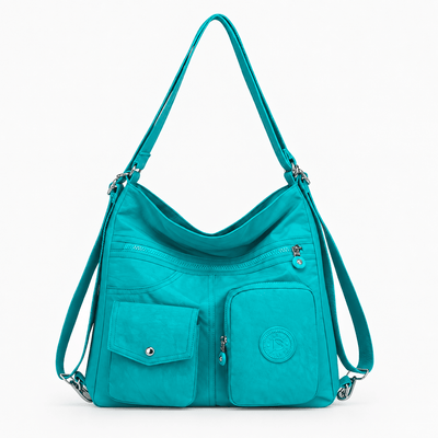 The Sunday Avenue Turquoise Stacey Blue Convertible Multi-Pocket Bag